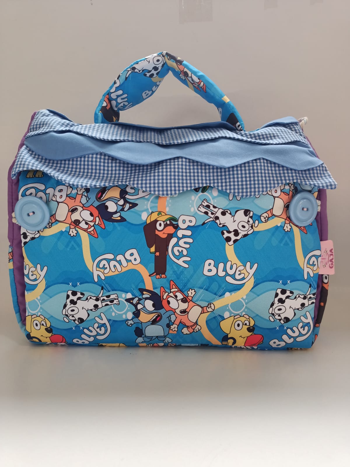 BOLSO CASITA BLUEY POMPONES